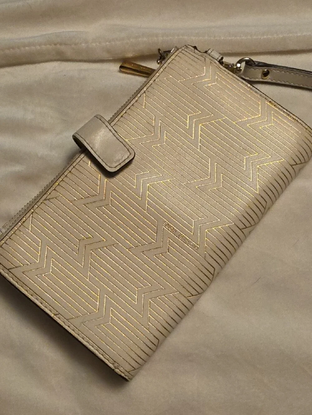 Michael Kors Cream Embossed Wristlet with Gold Accents